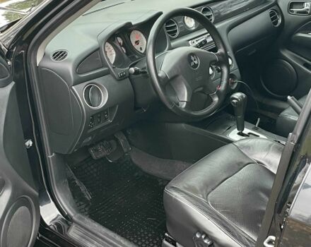 Черный Мицубиси Аутлендер, объемом двигателя 2.4 л и пробегом 213 тыс. км за 6850 $, фото 12 на Automoto.ua