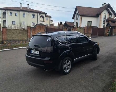 Черный Мицубиси Аутлендер, объемом двигателя 3 л и пробегом 220 тыс. км за 9000 $, фото 4 на Automoto.ua