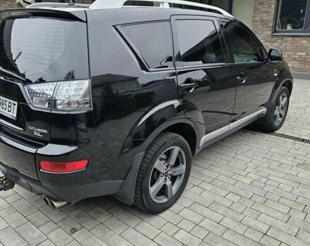 Черный Мицубиси Аутлендер, объемом двигателя 3 л и пробегом 238 тыс. км за 10800 $, фото 6 на Automoto.ua