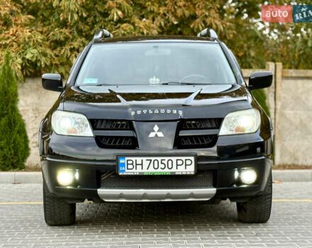 Міцубісі Аутлендер 2007 у Одесі на Automoto.ua Чорний Міцубісі Аутлендер, об'ємом двигуна 2.4 л та пробігом 201 тис. км за 7700 $, фото 37 на Automoto.ua