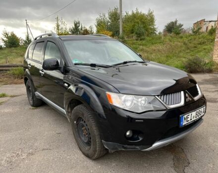 Черный Мицубиси Аутлендер, объемом двигателя 2.2 л и пробегом 190 тыс. км за 4800 $, фото 2 на Automoto.ua