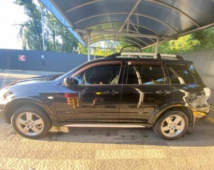 Черный Мицубиси Аутлендер, объемом двигателя 2.4 л и пробегом 219 тыс. км за 6500 $, фото 4 на Automoto.ua