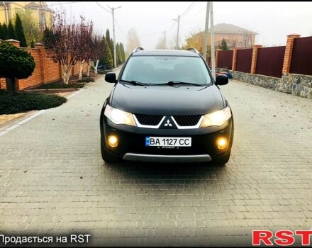 Черный Мицубиси Аутлендер, объемом двигателя 3 л и пробегом 230 тыс. км за 8999 $, фото 1 на Automoto.ua