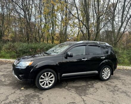 Черный Мицубиси Аутлендер, объемом двигателя 2.4 л и пробегом 230 тыс. км за 8500 $, фото 4 на Automoto.ua