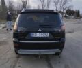 Черный Мицубиси Аутлендер, объемом двигателя 2 л и пробегом 290 тыс. км за 4900 $, фото 4 на Automoto.ua
