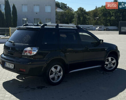 Чорний Міцубісі Аутлендер, об'ємом двигуна 2 л та пробігом 280 тис. км за 7500 $, фото 4 на Automoto.ua