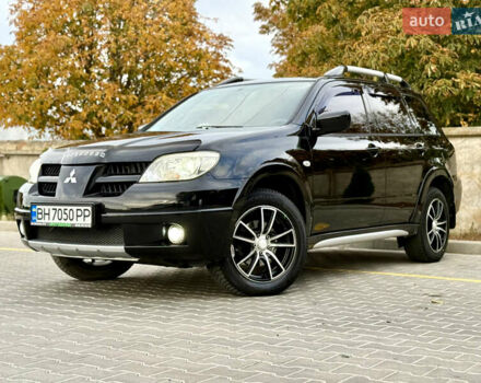 Міцубісі Аутлендер 2007 у Одесі на Automoto.ua Чорний Міцубісі Аутлендер, об'ємом двигуна 2.4 л та пробігом 201 тис. км за 7700 $, фото 30 на Automoto.ua