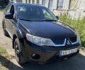 Черный Мицубиси Аутлендер, объемом двигателя 2 л и пробегом 430 тыс. км за 5200 $, фото 7 на Automoto.ua