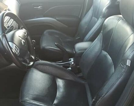 Черный Мицубиси Аутлендер, объемом двигателя 1.97 л и пробегом 244 тыс. км за 9000 $, фото 12 на Automoto.ua