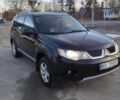 Черный Мицубиси Аутлендер, объемом двигателя 2 л и пробегом 290 тыс. км за 4900 $, фото 1 на Automoto.ua