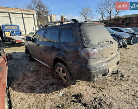 Черный Мицубиси Аутлендер, объемом двигателя 2 л и пробегом 258 тыс. км за 2200 $, фото 5 на Automoto.ua