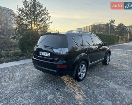 Черный Мицубиси Аутлендер, объемом двигателя 3 л и пробегом 205 тыс. км за 11300 $, фото 4 на Automoto.ua