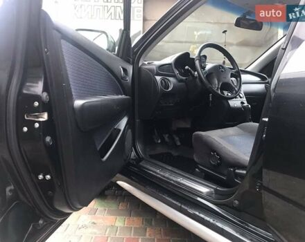 Черный Мицубиси Аутлендер, объемом двигателя 2 л и пробегом 284 тыс. км за 4999 $, фото 3 на Automoto.ua