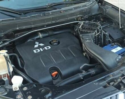 Черный Мицубиси Аутлендер, объемом двигателя 1.97 л и пробегом 244 тыс. км за 9000 $, фото 28 на Automoto.ua