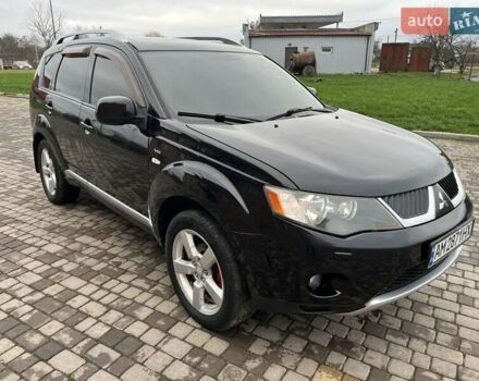 Черный Мицубиси Аутлендер, объемом двигателя 3 л и пробегом 200 тыс. км за 7999 $, фото 4 на Automoto.ua