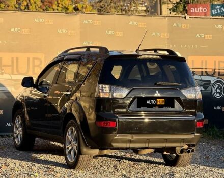 Черный Мицубиси Аутлендер, объемом двигателя 3 л и пробегом 198 тыс. км за 9500 $, фото 4 на Automoto.ua