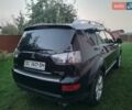 Черный Мицубиси Аутлендер, объемом двигателя 3 л и пробегом 260 тыс. км за 9000 $, фото 4 на Automoto.ua