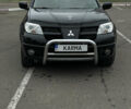 Чорний Міцубісі Аутлендер, об'ємом двигуна 2.38 л та пробігом 198 тис. км за 7100 $, фото 7 на Automoto.ua