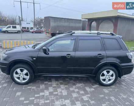 Чорний Міцубісі Аутлендер, об'ємом двигуна 2.38 л та пробігом 202 тис. км за 5800 $, фото 6 на Automoto.ua
