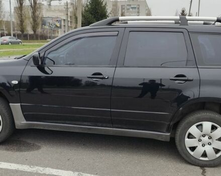 Чорний Міцубісі Аутлендер, об'ємом двигуна 2 л та пробігом 175 тис. км за 7800 $, фото 3 на Automoto.ua