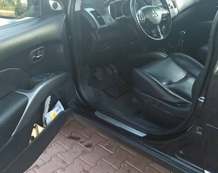 Черный Мицубиси Аутлендер, объемом двигателя 1.97 л и пробегом 244 тыс. км за 9000 $, фото 10 на Automoto.ua