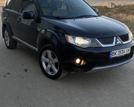 Чорний Міцубісі Аутлендер, об'ємом двигуна 2.4 л та пробігом 200 тис. км за 8300 $, фото 1 на Automoto.ua