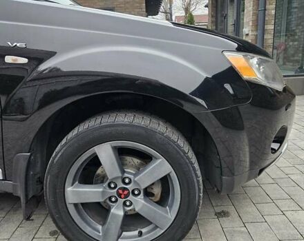 Черный Мицубиси Аутлендер, объемом двигателя 3 л и пробегом 238 тыс. км за 10800 $, фото 4 на Automoto.ua