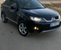 Чорний Міцубісі Аутлендер, об'ємом двигуна 2.4 л та пробігом 200 тис. км за 8300 $, фото 1 на Automoto.ua