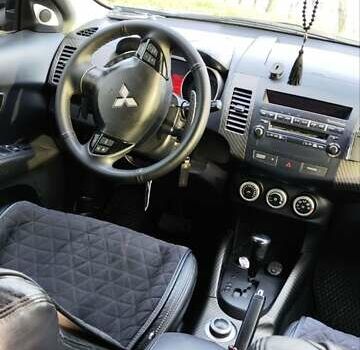 Черный Мицубиси Аутлендер, объемом двигателя 3 л и пробегом 190 тыс. км за 10000 $, фото 22 на Automoto.ua