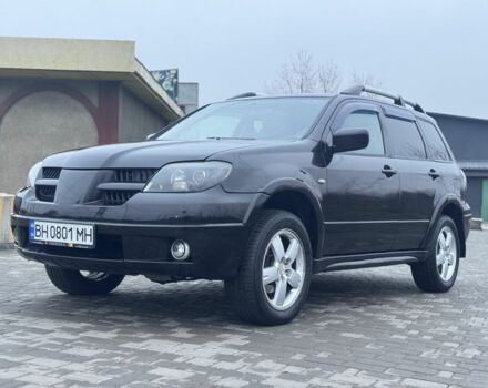 Чорний Міцубісі Аутлендер, об'ємом двигуна 2.4 л та пробігом 202 тис. км за 5800 $, фото 1 на Automoto.ua