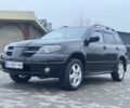 Чорний Міцубісі Аутлендер, об'ємом двигуна 2.4 л та пробігом 202 тис. км за 5800 $, фото 1 на Automoto.ua