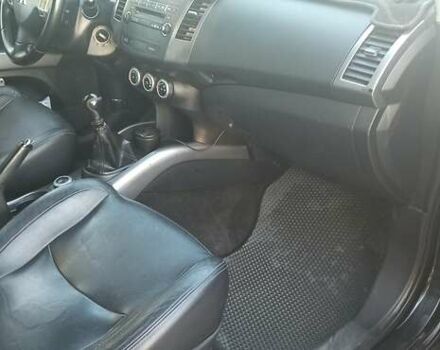 Черный Мицубиси Аутлендер, объемом двигателя 1.97 л и пробегом 244 тыс. км за 9000 $, фото 24 на Automoto.ua