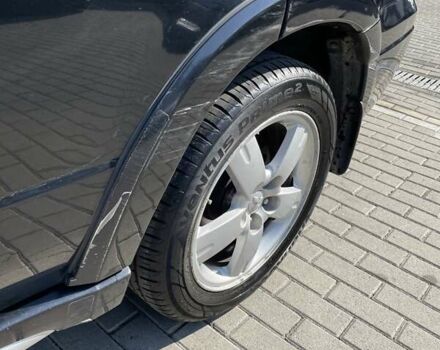 Черный Мицубиси Аутлендер, объемом двигателя 2.38 л и пробегом 310 тыс. км за 7500 $, фото 7 на Automoto.ua