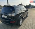 Черный Мицубиси Аутлендер, объемом двигателя 2.4 л и пробегом 234 тыс. км за 7400 $, фото 5 на Automoto.ua