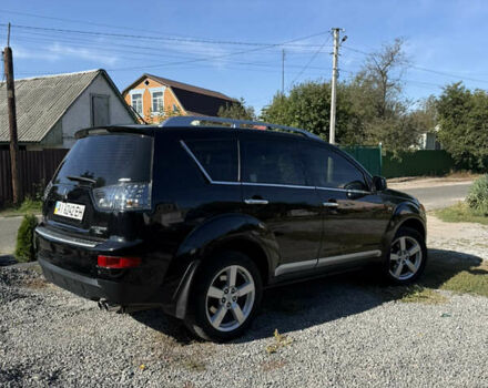 Черный Мицубиси Аутлендер, объемом двигателя 3 л и пробегом 180 тыс. км за 11200 $, фото 4 на Automoto.ua