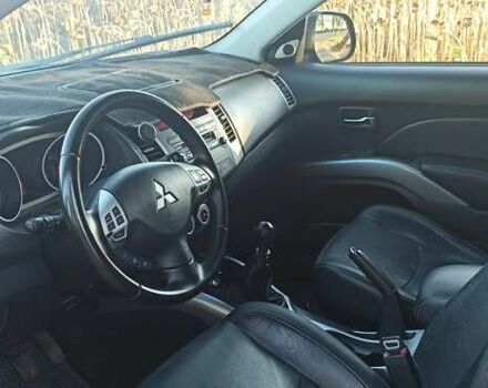 Черный Мицубиси Аутлендер, объемом двигателя 1.97 л и пробегом 244 тыс. км за 9000 $, фото 11 на Automoto.ua
