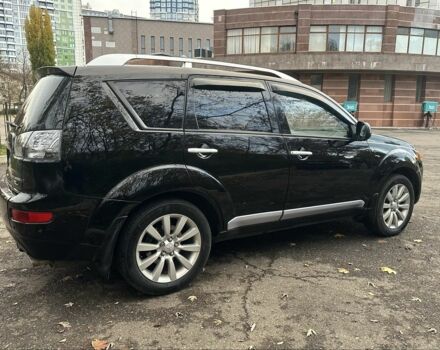 Черный Мицубиси Аутлендер, объемом двигателя 2.4 л и пробегом 230 тыс. км за 8500 $, фото 7 на Automoto.ua