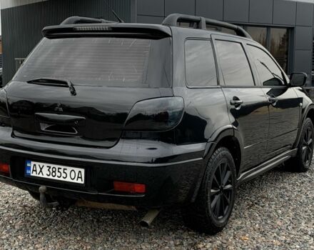 Міцубісі Аутлендер 2007 у Харкові на Automoto.ua Чорний Міцубісі Аутлендер, об'ємом двигуна 2.4 л та пробігом 240 тис. км за 5600 $, фото 4 на Automoto.ua