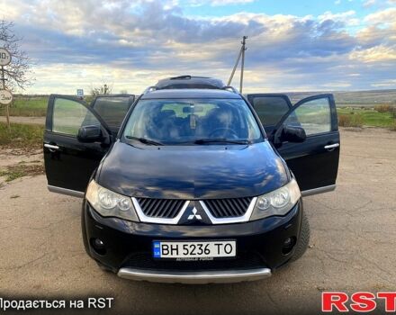Черный Мицубиси Аутлендер, объемом двигателя 2 л и пробегом 207 тыс. км за 8100 $, фото 5 на Automoto.ua