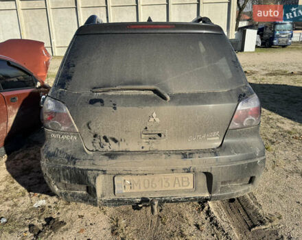 Черный Мицубиси Аутлендер, объемом двигателя 2 л и пробегом 258 тыс. км за 2200 $, фото 4 на Automoto.ua