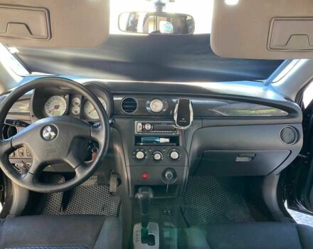 Черный Мицубиси Аутлендер, объемом двигателя 2.4 л и пробегом 219 тыс. км за 6500 $, фото 8 на Automoto.ua