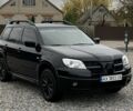 Міцубісі Аутлендер 2007 у Харкові на Automoto.ua Чорний Міцубісі Аутлендер, об'ємом двигуна 2.4 л та пробігом 240 тис. км за 5600 $, фото 1 на Automoto.ua