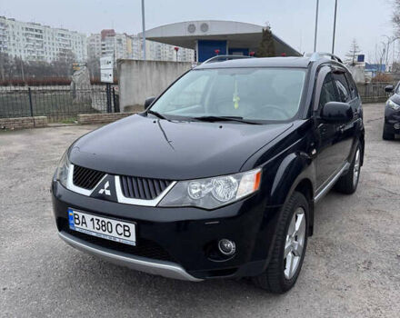 Черный Мицубиси Аутлендер, объемом двигателя 3 л и пробегом 202 тыс. км за 9999 $, фото 1 на Automoto.ua