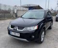 Черный Мицубиси Аутлендер, объемом двигателя 3 л и пробегом 202 тыс. км за 9999 $, фото 1 на Automoto.ua