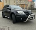 Черный Мицубиси Аутлендер, объемом двигателя 2.38 л и пробегом 319 тыс. км за 4800 $, фото 6 на Automoto.ua