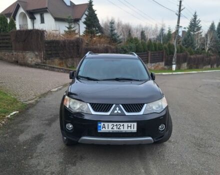 Черный Мицубиси Аутлендер, объемом двигателя 3 л и пробегом 220 тыс. км за 9000 $, фото 1 на Automoto.ua