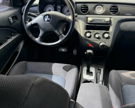 Черный Мицубиси Аутлендер, объемом двигателя 2.4 л и пробегом 258 тыс. км за 6300 $, фото 15 на Automoto.ua