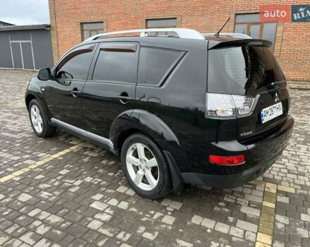 Черный Мицубиси Аутлендер, объемом двигателя 3 л и пробегом 200 тыс. км за 7999 $, фото 13 на Automoto.ua