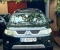 Чорний Міцубісі Аутлендер, об'ємом двигуна 2 л та пробігом 263 тис. км за 8500 $, фото 1 на Automoto.ua