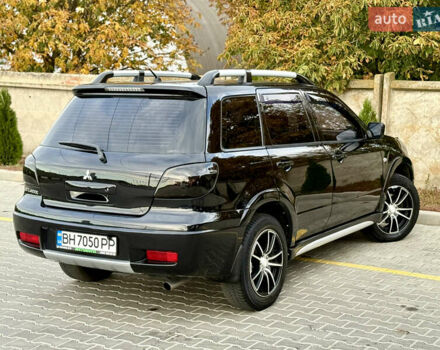 Міцубісі Аутлендер 2007 у Одесі на Automoto.ua Чорний Міцубісі Аутлендер, об'ємом двигуна 2.4 л та пробігом 201 тис. км за 7700 $, фото 8 на Automoto.ua
